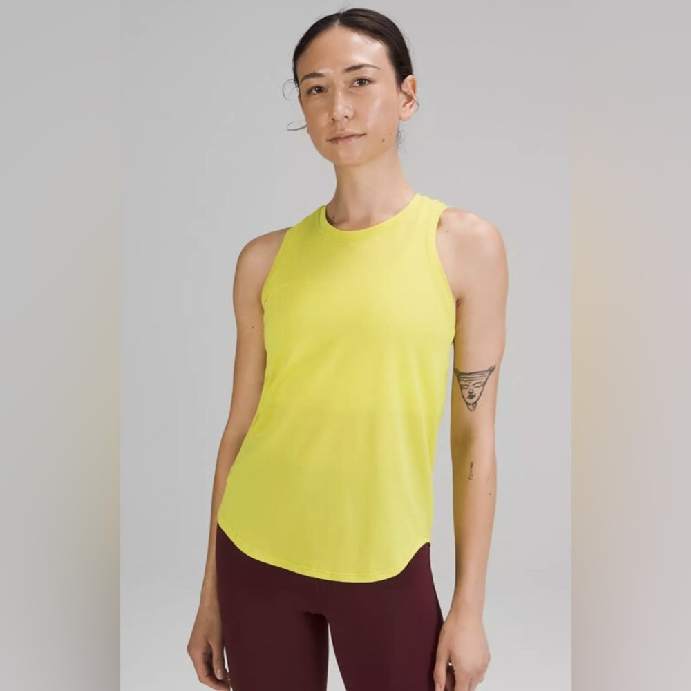 Lululemon | Women's Charteuse Yellow Racerback Rounded Split Hem Tank Top Sz M